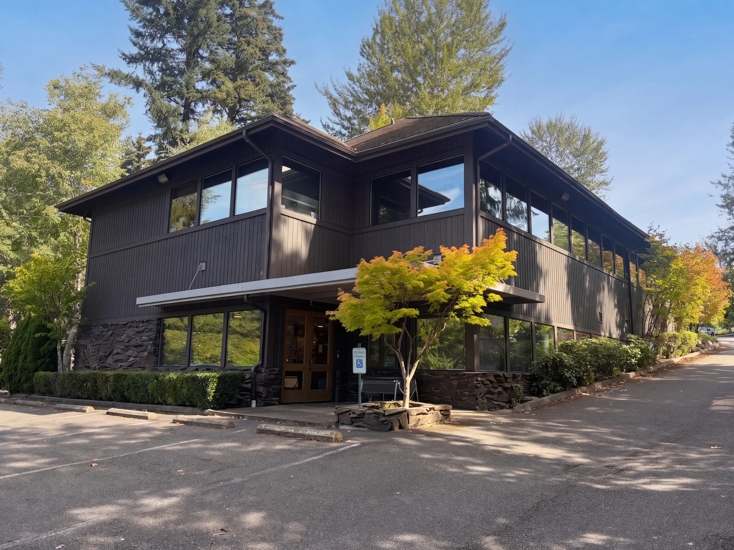 Pacific North office building in Bothell surrounded by mature trees